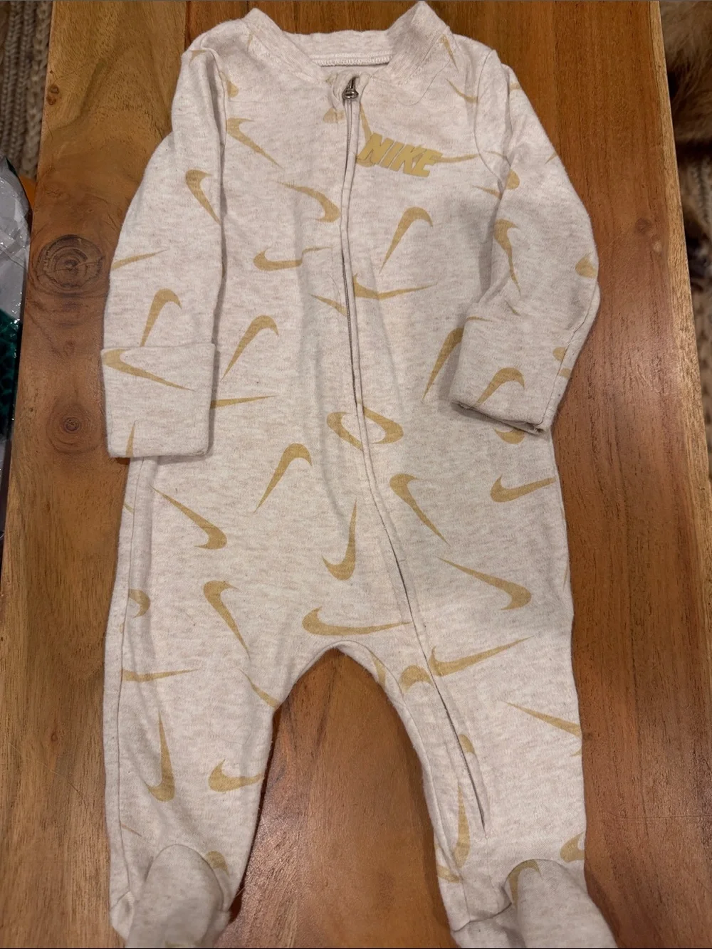 Nike One-Piece Footed Romper with Swoosh Print